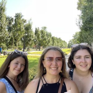 Traveling Trio Family in Retiro Park in Madrid, Spain