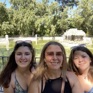 Traveling Trio Family in Retiro Park in Madrid, Spain