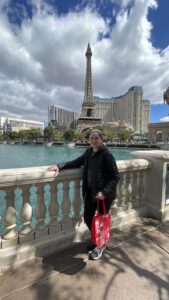 Gluten-free Traveling Family Trio taking a picture by Paris Hotel, Las Vegas, Nevada