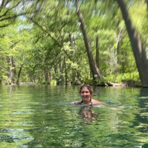 Gluten-Free Traveling Trio Family taking a picture in Blue Hole Regional Park, Texas