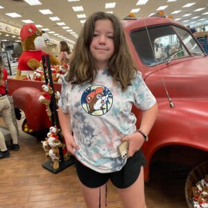 Gluten-Free Traveling Trio Family taking a picture in Buc-ee's, Texas